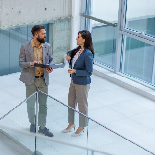 Professional conversation in office setting Getty Images 2253080600 resource center 952x661